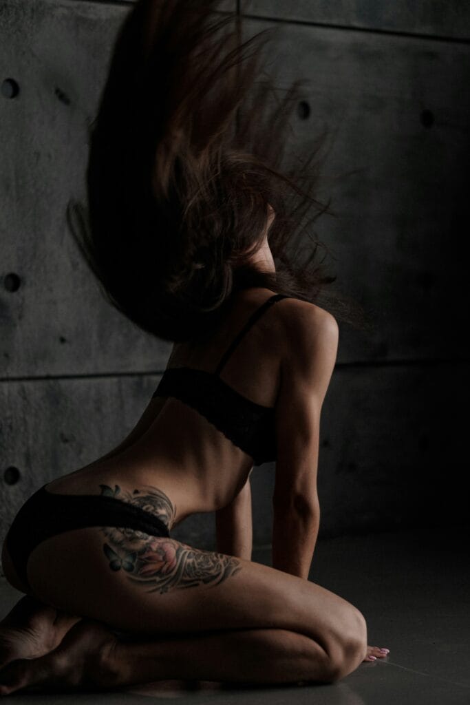 ESCORT SERVICE IN DLF GURGAON Woman browsing a verified escort profile on a tablet, showcasing Jass Escorts’ professionalism.